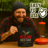 Man with beanie and beard holding Redline Nectar